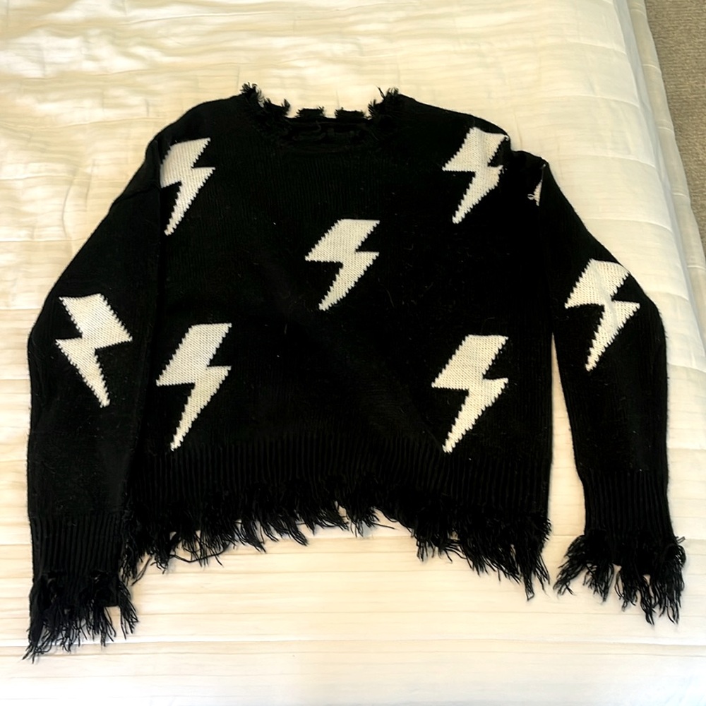 Black with white lighting bolts, Rock and Rags sweater only wore a few times